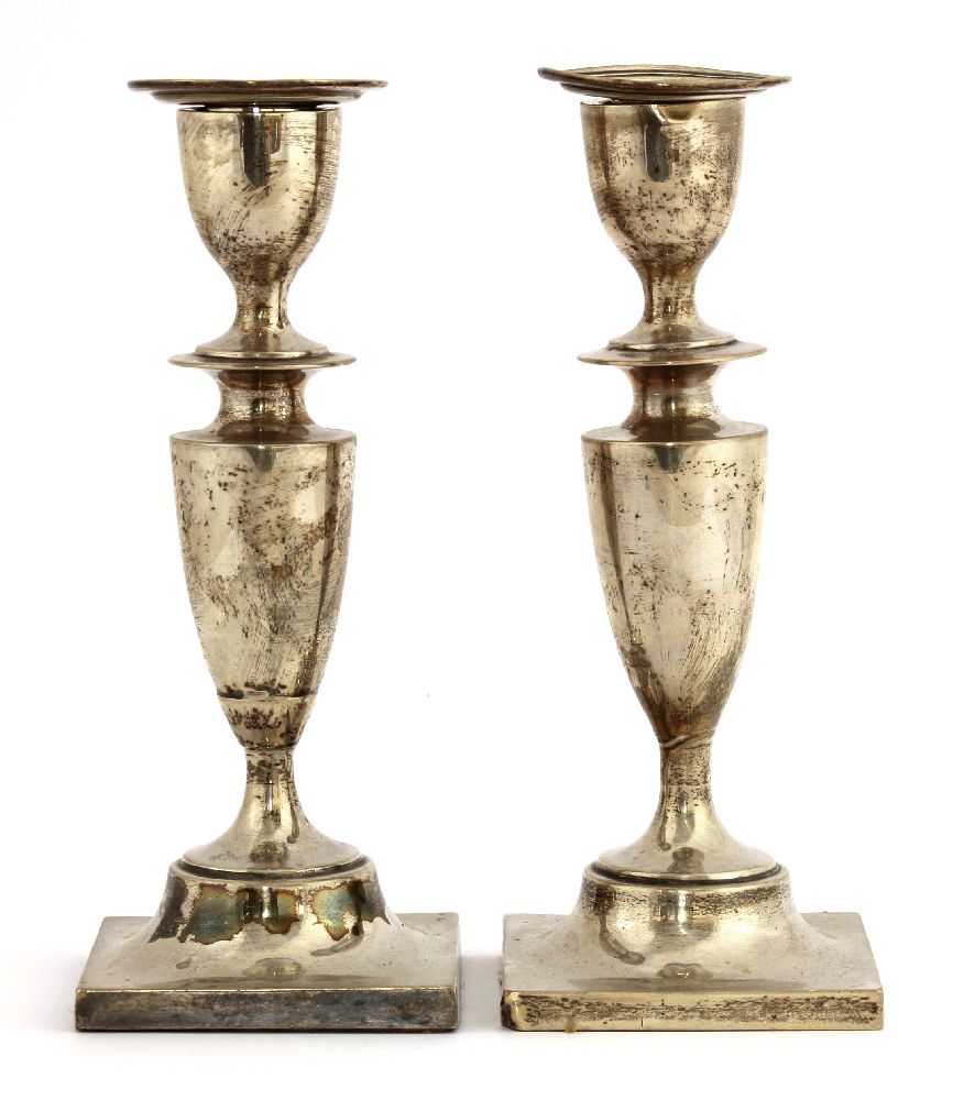 A pair of Edwardian silver candlesticks, London 1903, by Charles Boyton (II), the plain vase-