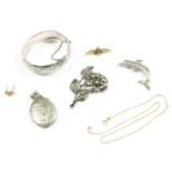 A collection of costume jewellery, to include a sterling silver flower brooch, stamped sterling with