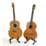 An Admira 2000 E electro-acoustic classical guitar, together with an Encore electro-acoustic guitar,