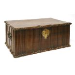 An Indo-Portuguese hardwood box, 18th century, of serpentine form, with a brass studded lid and