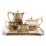 A silver four piece tea and coffee set, Garrard & Co. London, 1966, together with a silver plated