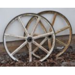 Two horse cart wheels with seven spokes