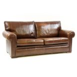 A modern brown leather settee, bought from John Lewis, 200cm