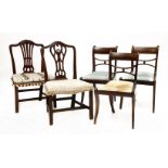 Three Regency mahogany bar back single chairs, with sabre legs, and two George III mahogany single