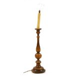 A 19th century fruitwood torchere, with turned column on stepped circular base, 118cm high