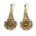 A pair of high carat gold Anglo-Indian filigree drop earrings, the central oval boss decorated