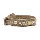 A 19th century leather, brass and steel studded dog collar, 17cm diameter