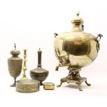 A large brass samovar together with a quantity of eastern brassware, the samovar 65cm