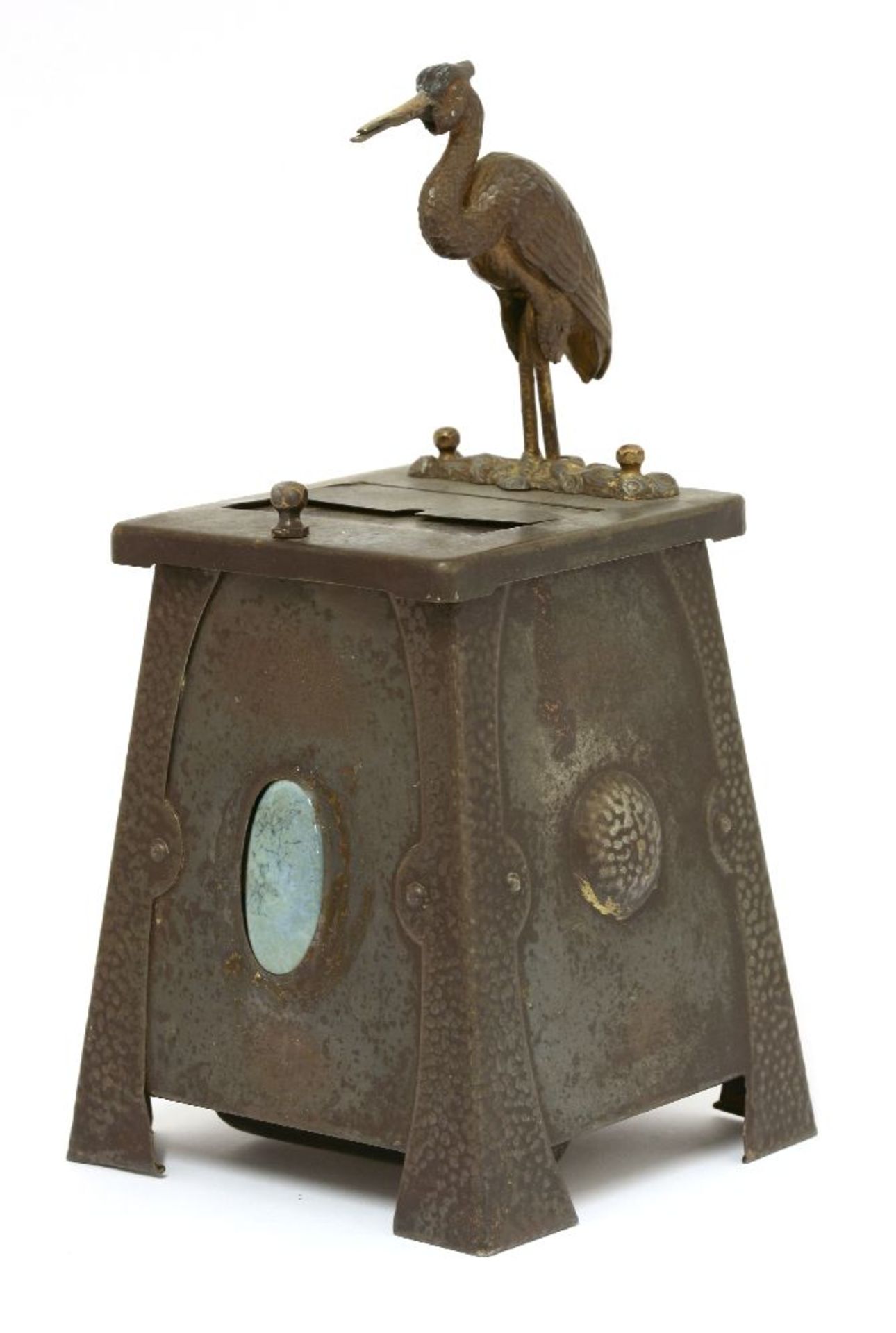 An Art Nouveau tinplate cigarette dispenser,mounted with a stork automata, the front panel mounted
