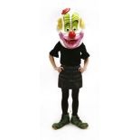 A CLOWN HEAD AND BOOTSlate 20th century, a large, fibreglass, brightly coloured, clown head mask and