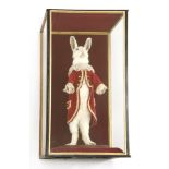 A DRESSED WHITE RABBIT,late 20th century, a taxidermy white rabbit dressed in a fine court coat,