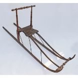 A WOODEN SLEDGE,early 20th century, beechwood sledge, possibly American,64cm wide, 220cm deep,