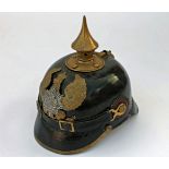 A PRUSSIAN PICKELHAUBE HELMET,a military interest German/Pussian Picklehaube helmet with a brass