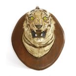 A TIGER HEAD MOUNT, ¨early 20th century, a taxidermy tiger head mount attributed to Theobald Bros,