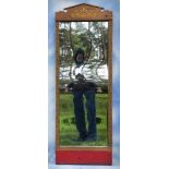 A FAIRGROUND MIRROR,a large vintage 'house of mirrors' fairground convex distorting mirror, with