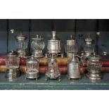 A COLLECTION OF TEN FRENCH PEPPER GRINDERS,1860-1900, a variety of designs in silver, pewter and