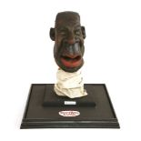 ROBERT MUGABE,1980/90s, an original Spitting Image puppet head of Robert Mugabe, mounted in a