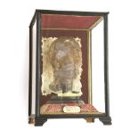 MUMMY'S HEAD,late 20th century, a novelty, hoax Egyptian mummy's resin head, mounted in a glass