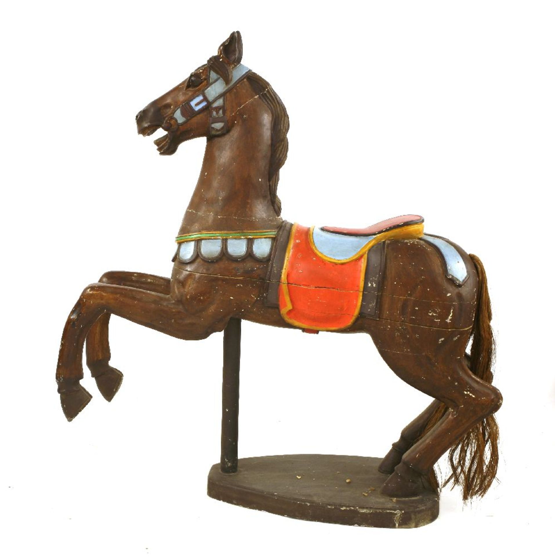 FAIRGROUND HORSE,early 20th century, a carved wooden and polychrome painted fairground carousel