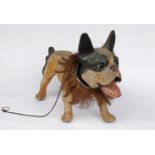 GROWLER DOG,early 20th century, a papier mâché growler dog,48cm wide, 23cm deep, 36cm high