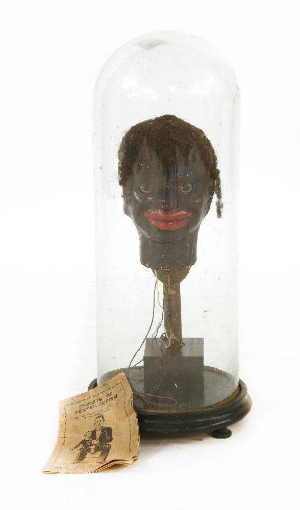 A PAPIER-MÂCHÉ VENTRILOQUIST'S DUMMY,early 20th century, mounted beneath a glass dome,54cm high