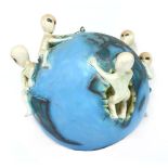 ALIEN GLOBE,a bizarre resin sculpture of aliens emerging from a planet, believed to have been made