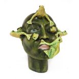 MACIAS HEAD (BARCELONA),1960s, Italian, a ceramic head with frogs bursting from the skin and eyes,