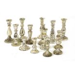 FOURTEEN SILVERED CANDLESTICKS,a good collection of mercury silvered glass candlesticks,largest 21cm