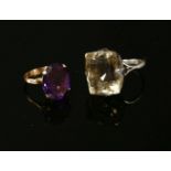 A gold single stone synthetic colour change sapphire ring, claw set to a plain polished shank, (