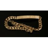 A 9ct gold flat filed curb link identity bracelet, with engraved inscriptions, 16.84g