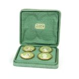 Four cased painted miniature buttons of young maidens, framed in gilt metal circular mount, in a