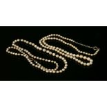 A single row graduated cultured pearl necklace, strung knotted to a bolt ring clasp, 3.5-6.00mm, and