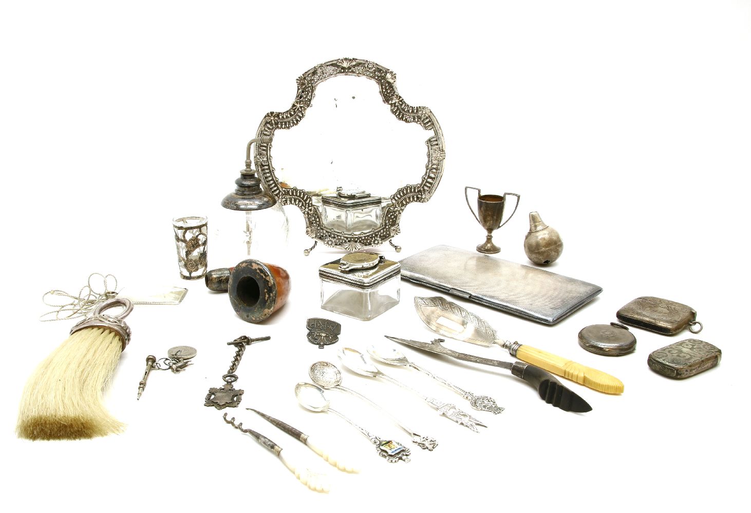 A quantity of silver, to include cut glass and silver atomiser, silver mounted comb brush, engine