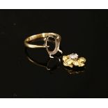 A single stone diamond ring, a brilliant cut diamond claw set to a gold nugget, claw set to a