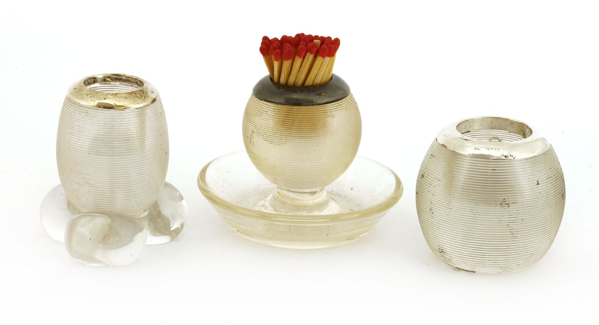 Three glass and silver-mounted vesta strikers,with reeded sides, various dates and makers,largest