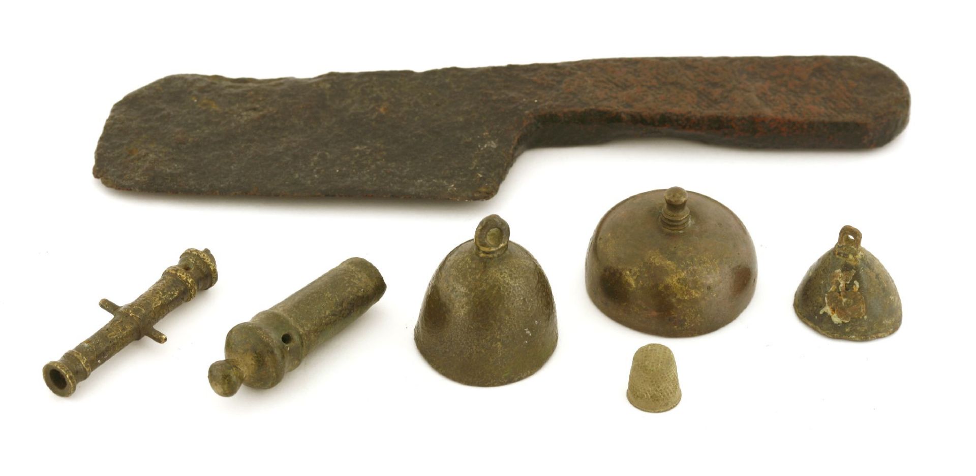 A group of three archaic bronze bells,the largest 4.25cm diameter,together with two cast bronze