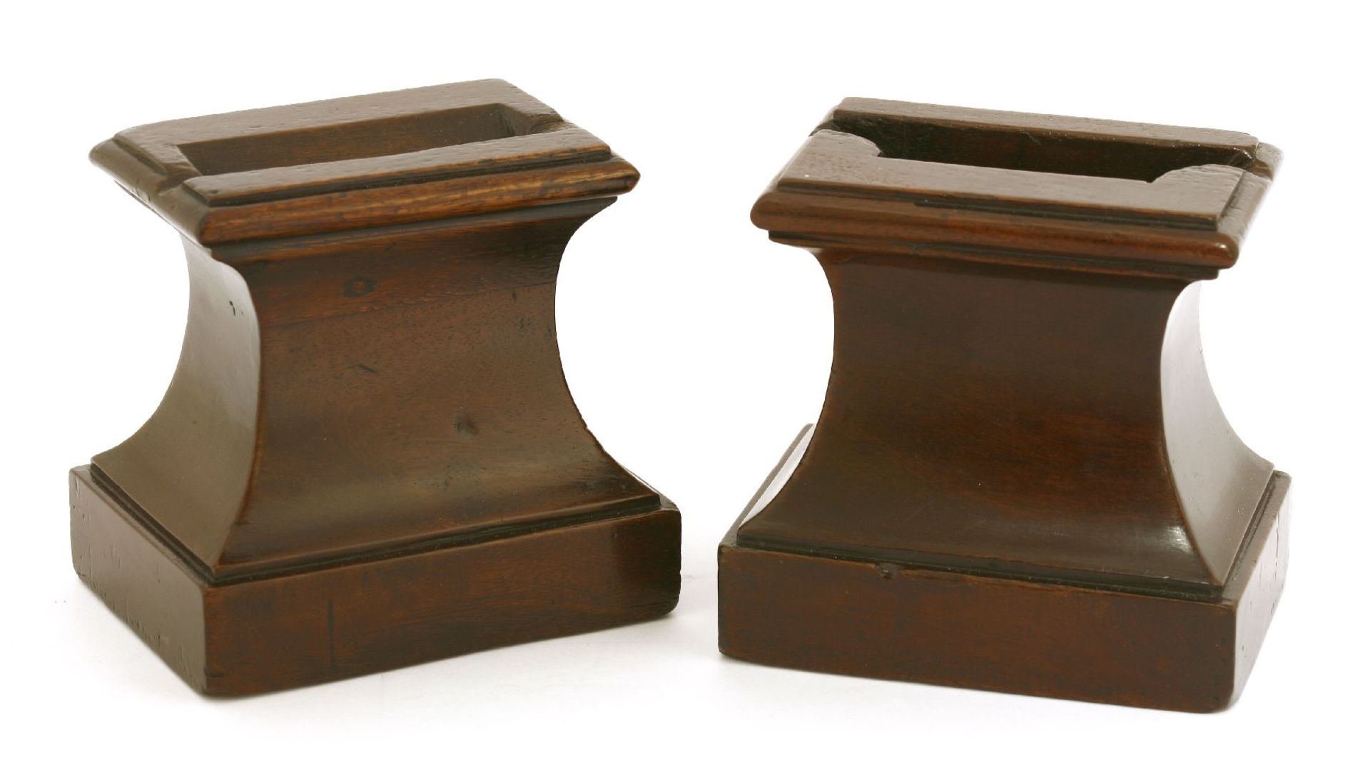 A pair of mahogany and lead-weighted dish stands,late 18th century, each of rectangular waisted form