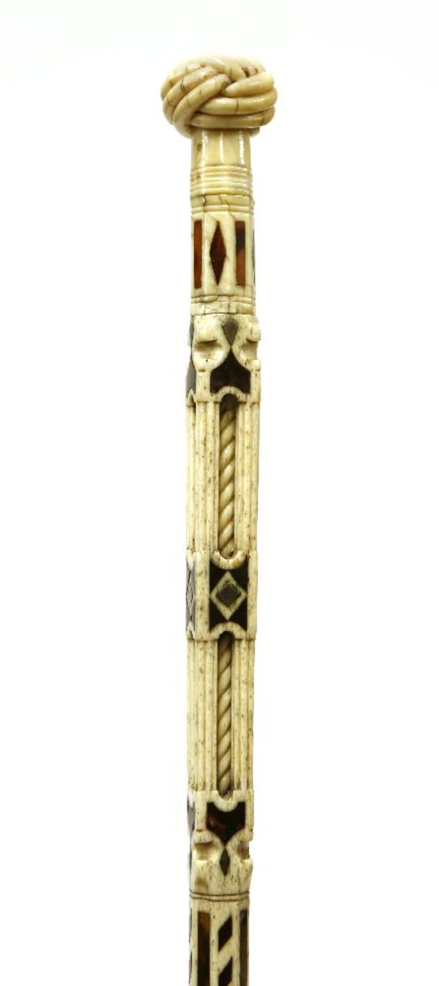 A fine and rare marine ivory and whalebone walking stick,with a Turk's knot over octagonal and