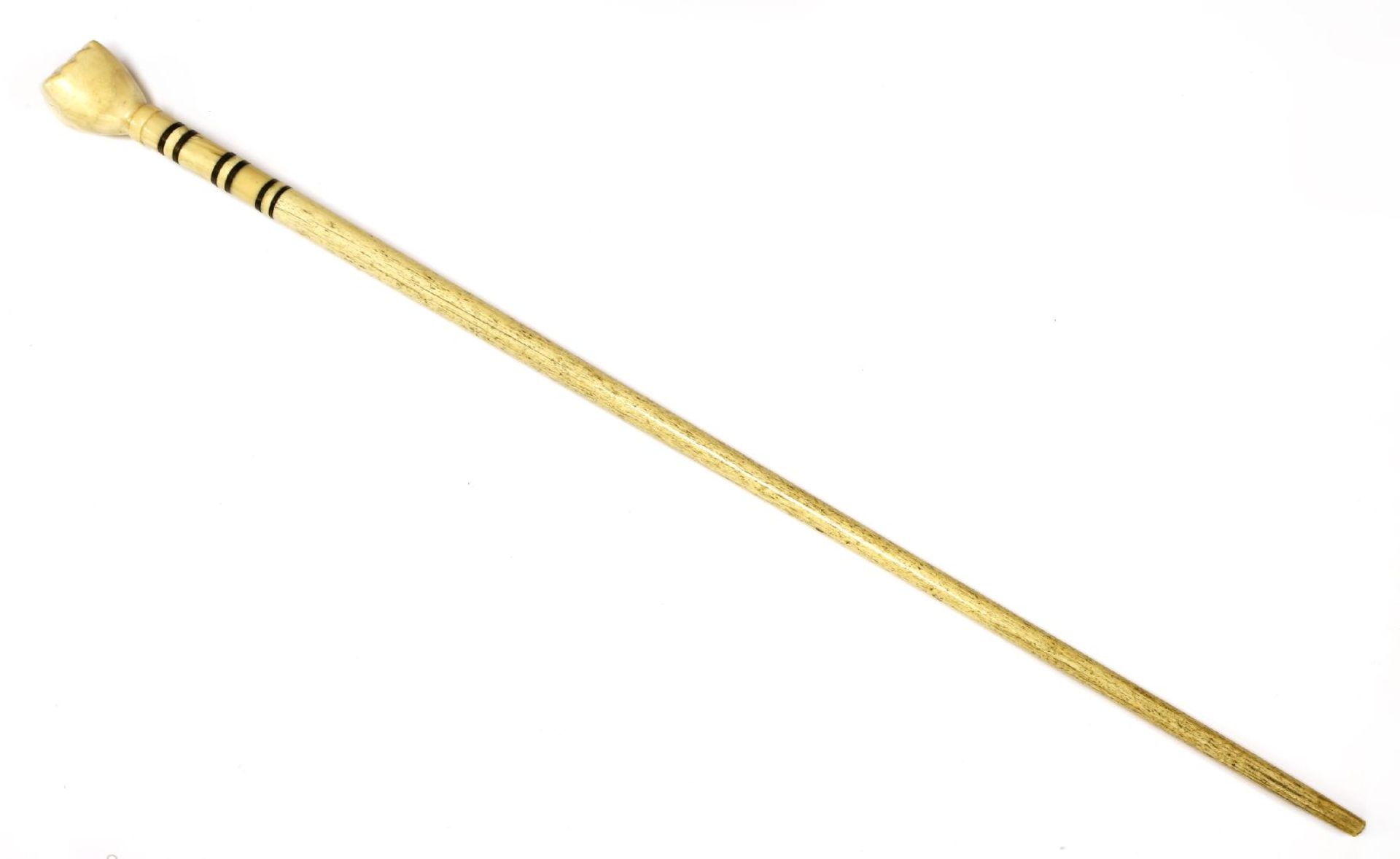 A marine ivory and whalebone walking stick,with a clenched hand over six baleen discs, on a plain - Image 2 of 2