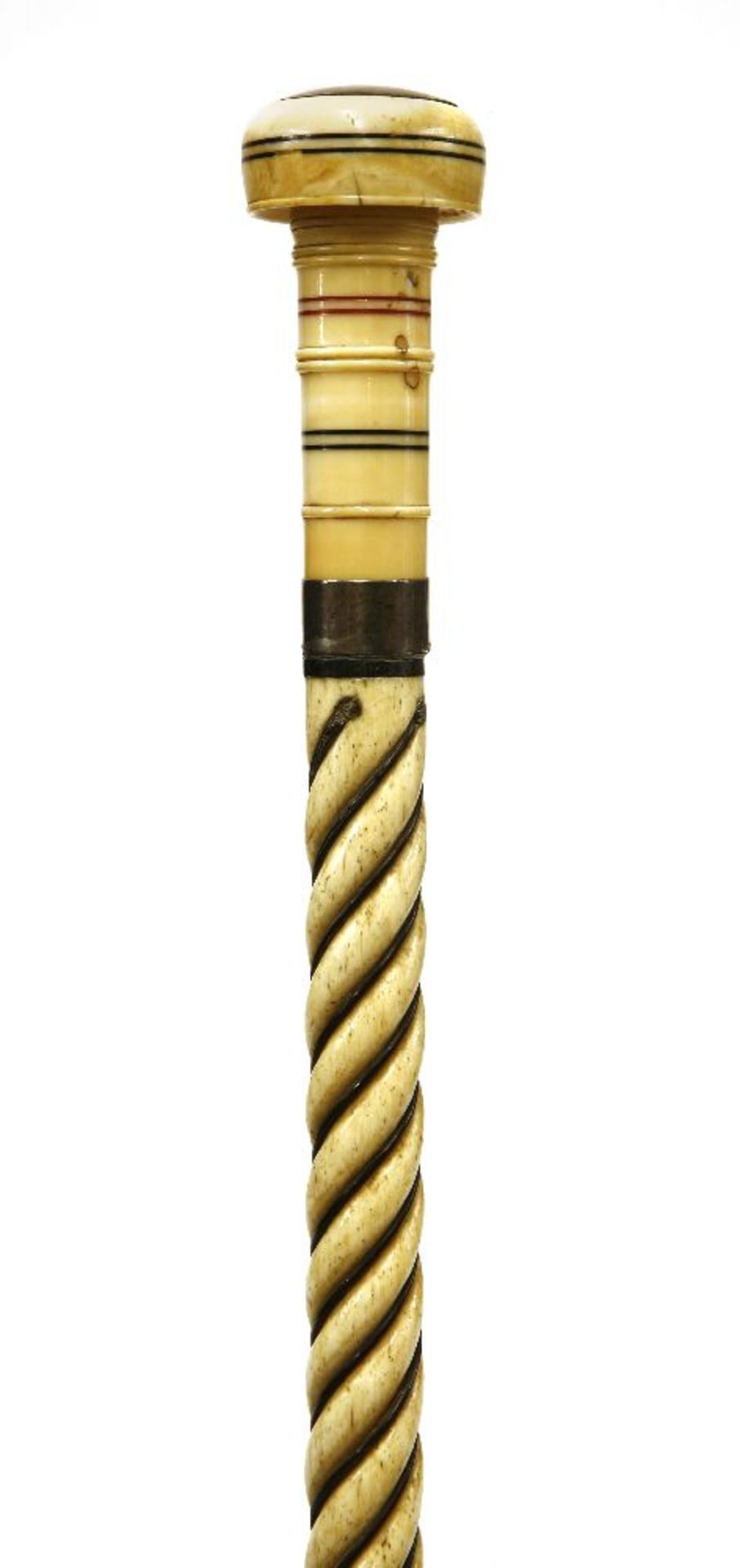 A marine ivory and whalebone walking stick,the compressed turned disc with silver inset engraved
