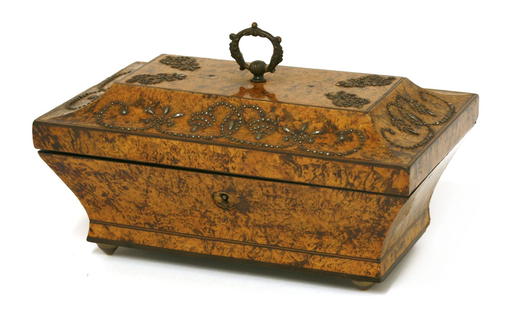 A Regency burrwood musical jewellery box,of sarcophagus shape with polished steel details and a cast