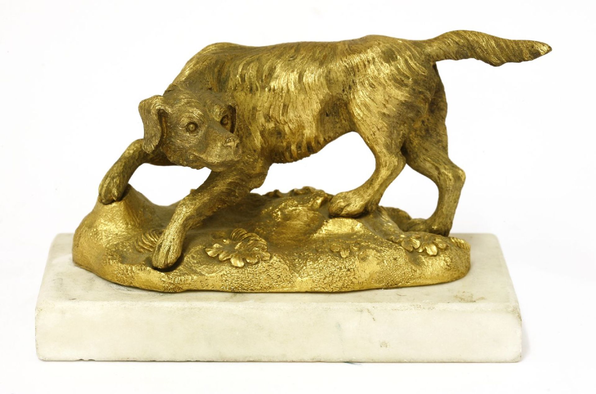 A gilt bronze animalier figure of a pointer,c.1850, on a white marble base,16cm wide