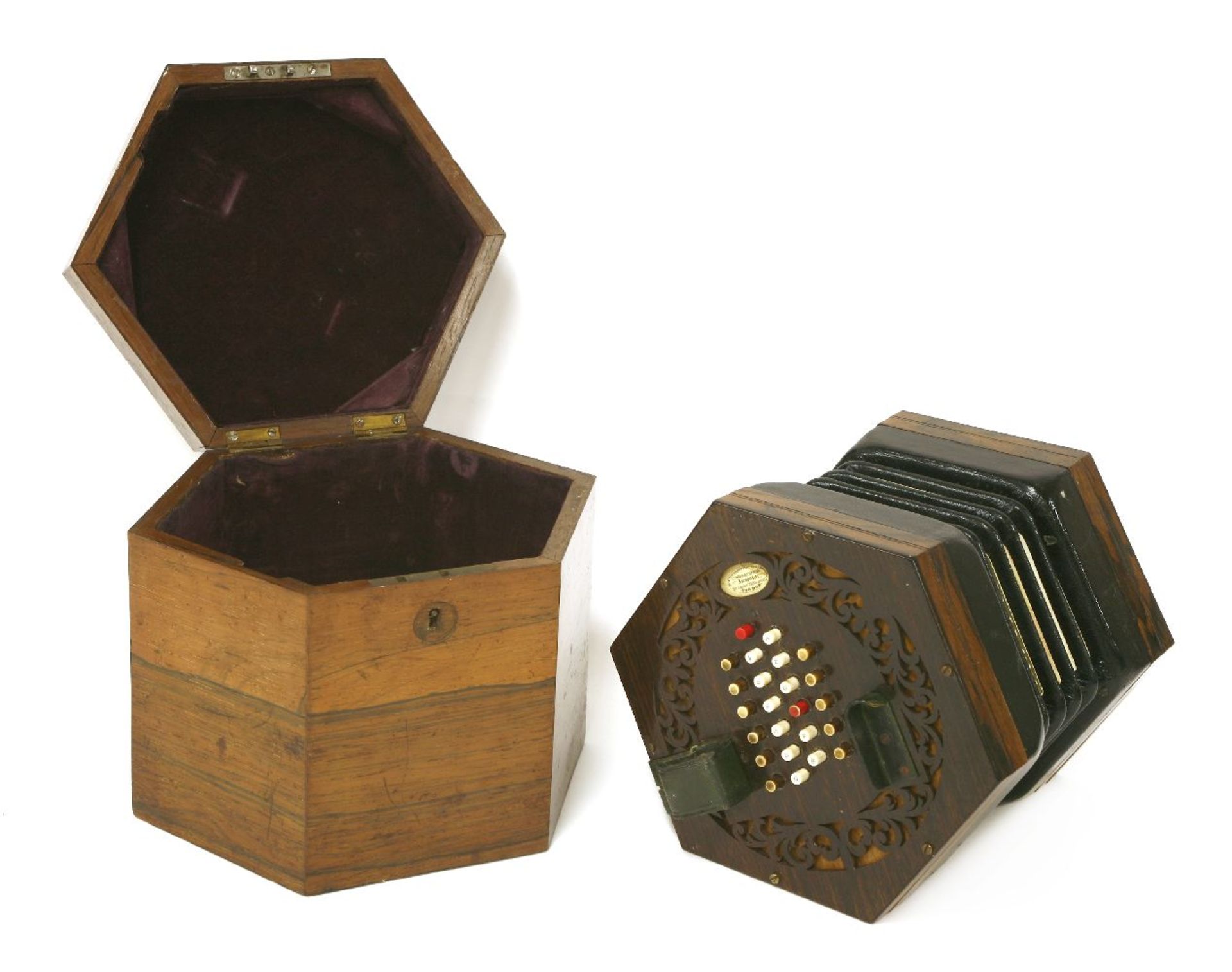 A Wheatstone rosewood hexagonal forty-eight button concertina,labelled 'C. Wheatstone, inventor 20