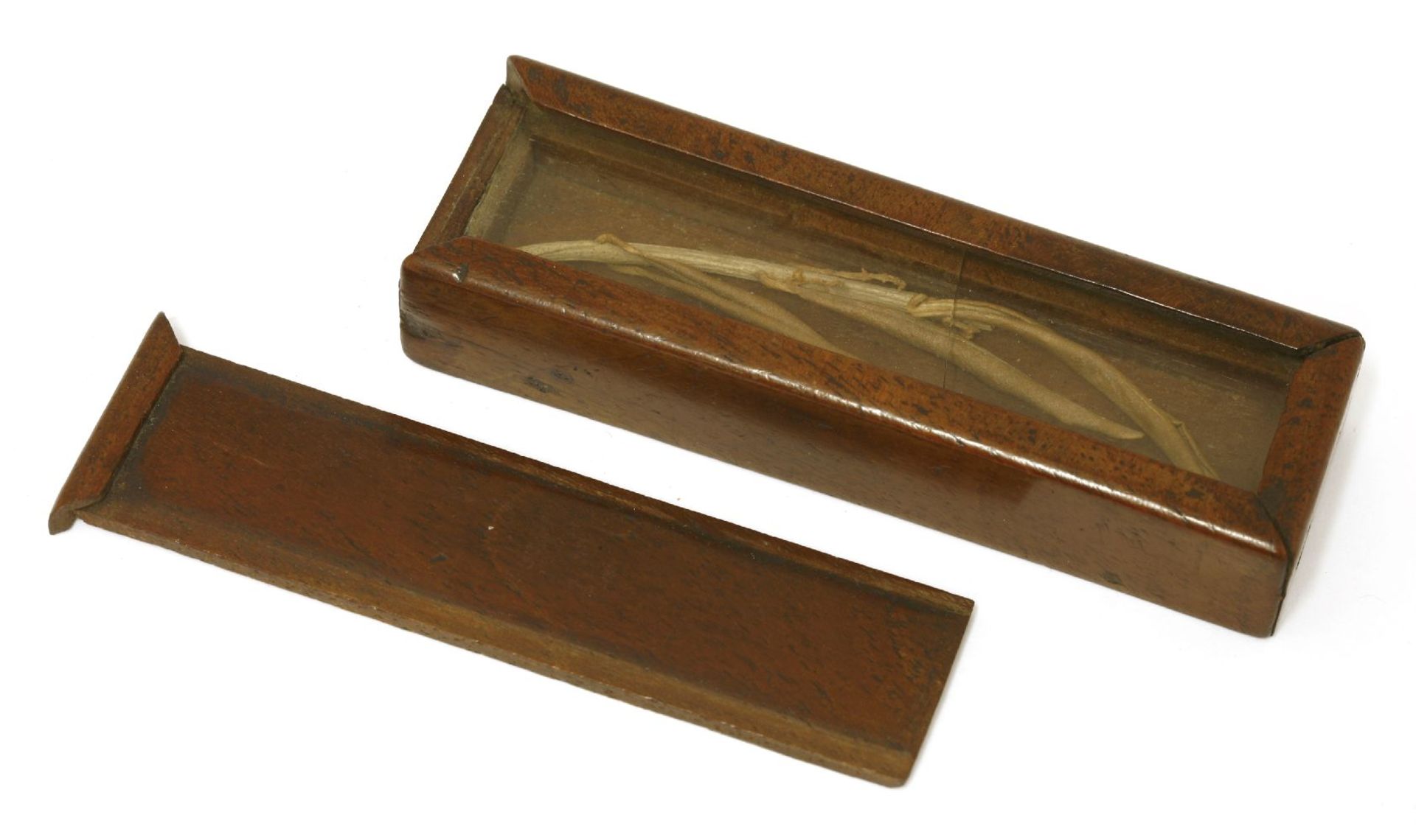 A mahogany rectangular box, c.1841, with a sliding top enclosing a glazed compartment and an olive