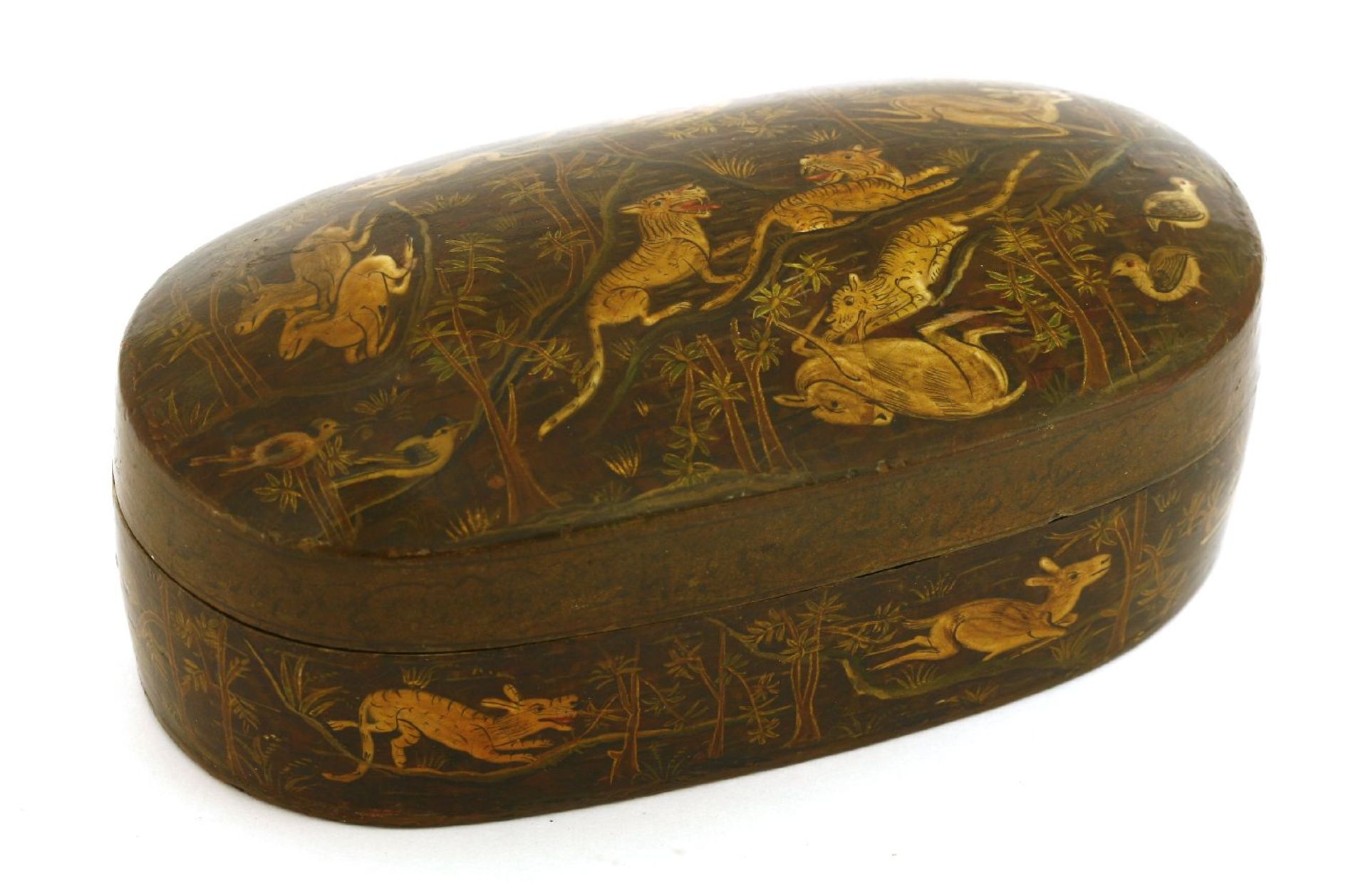 A Persian oval lacquer box and cover,late 19th century, painted with tigers, deer and rabbits,17cm