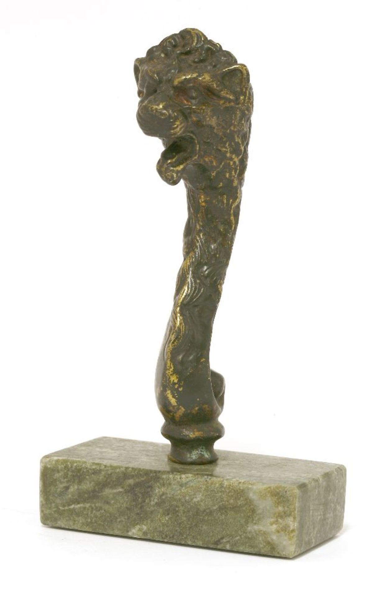 A bronze finial,possibly late 15th century, in the form of a lion's head on a scrolled 'neck', now