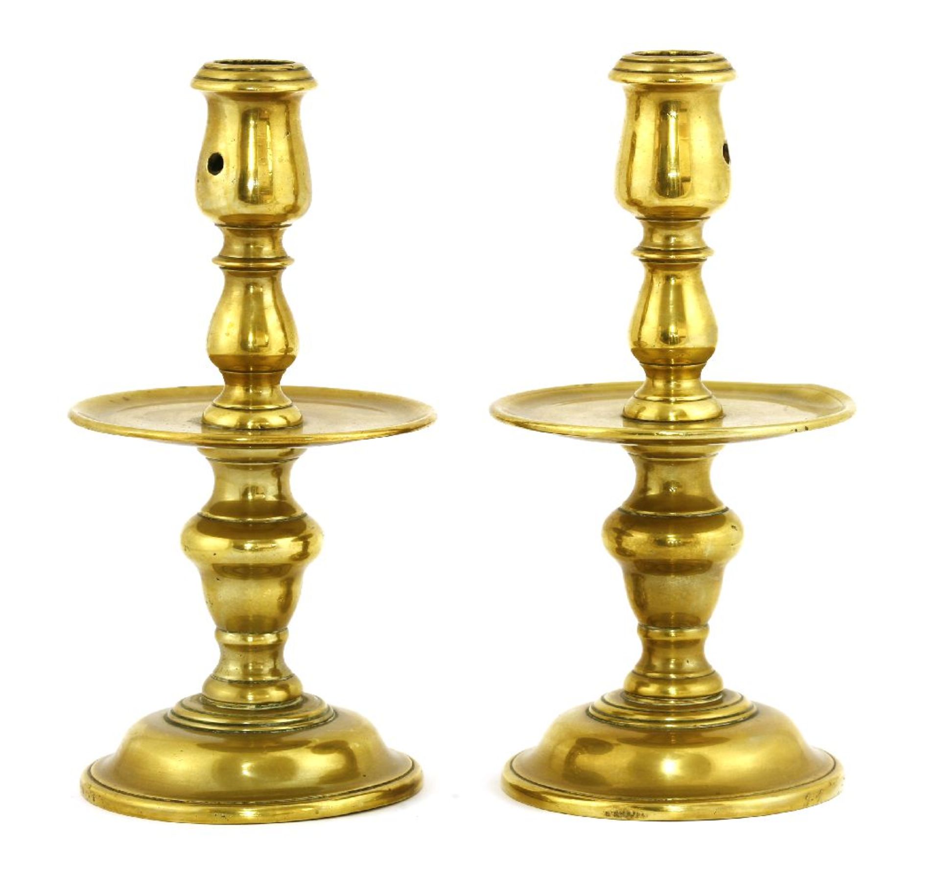 A pair of Heemskerk-type brass candlesticks,early 18th century, Dutch, 22cm high (2)