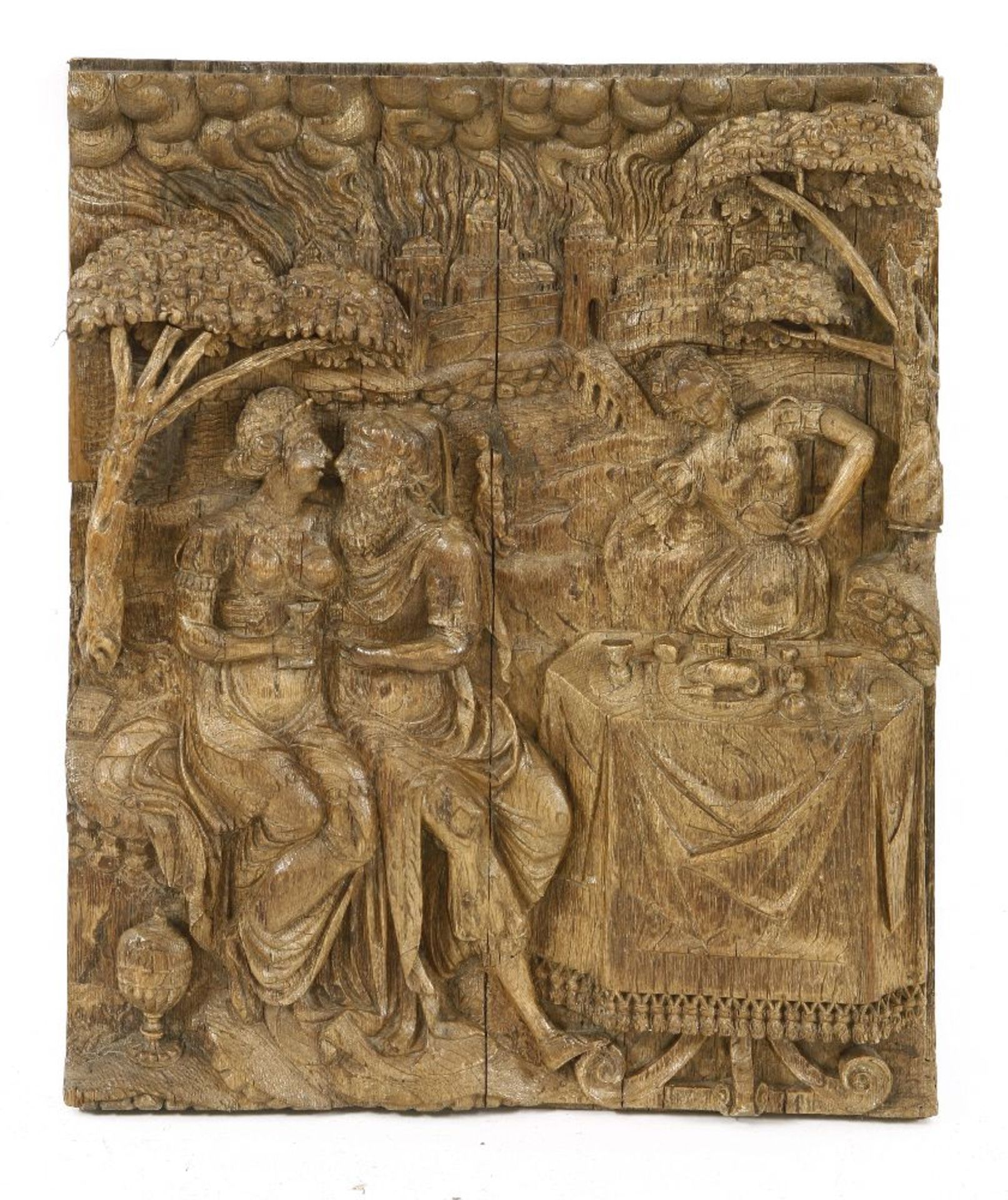 An oak panel,17th century, probably Flemish, carved in relief with Lot and his daughters in the
