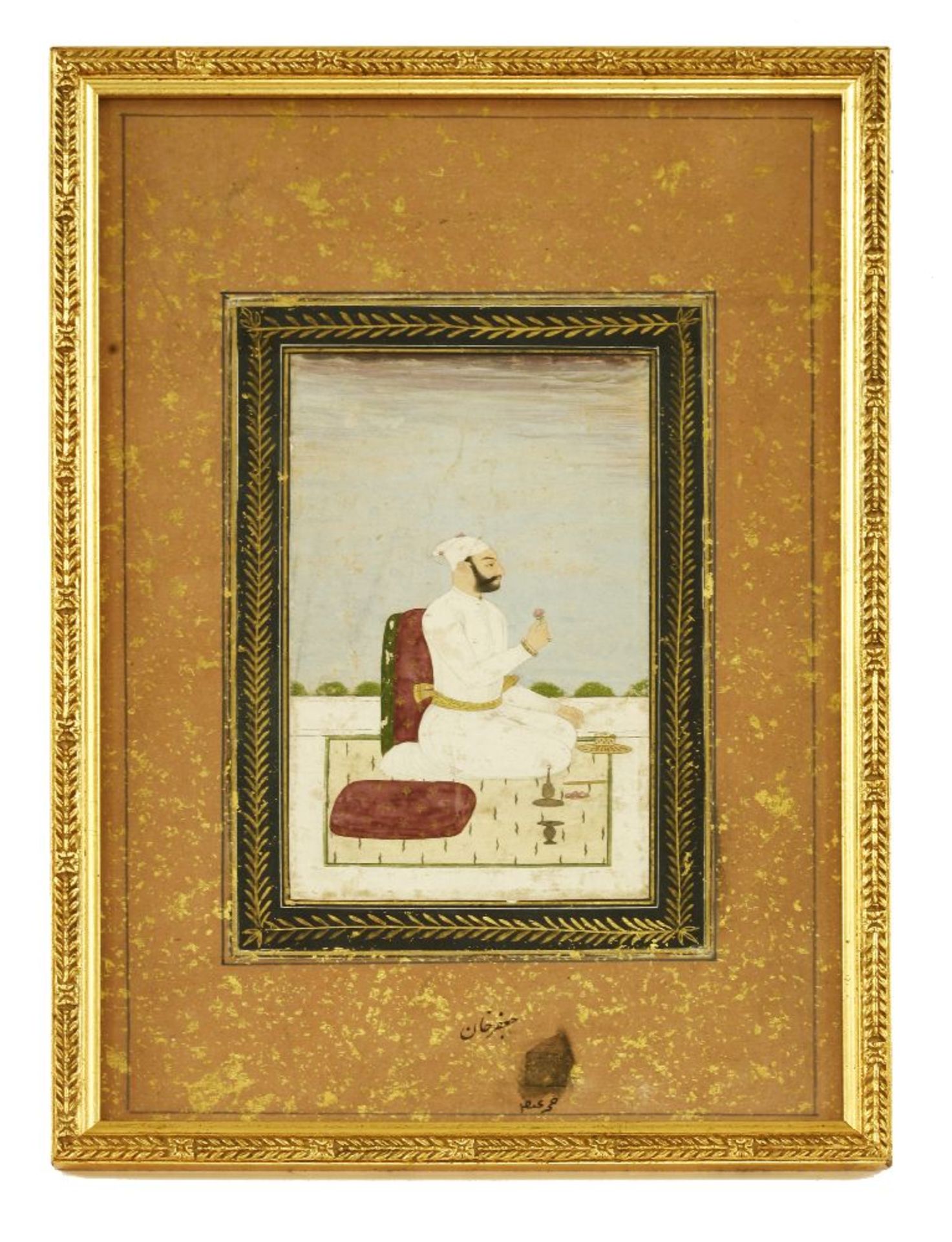 An Indian miniature of a gentleman on horseback, a leaf from a book,together with a further