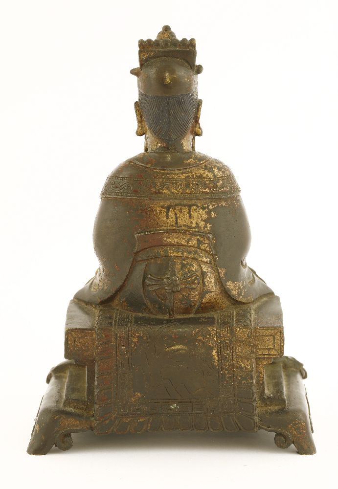 A Chinese bronze figure, Ming dynasty or later, seated on a raised platform with both hands held - Image 2 of 2